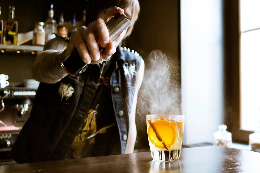 A bartender preparing a drink
